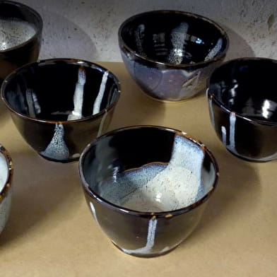 Les mains et l'argile