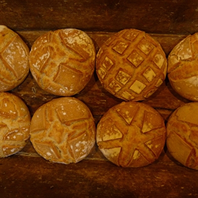 Enfournement des pains et des brioches - Ecomusée maison Michaud